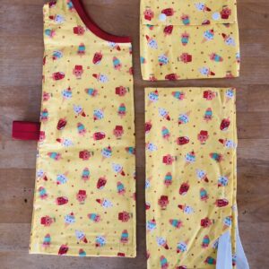 Kit maternelle Maman Cactus comprenant des draps en coton biologique, un tablier pratique et un sac à goûter coloré, pour accompagner les enfants à l'école.