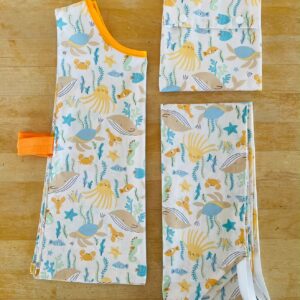Kit maternelle Maman Cactus comprenant des draps en coton biologique, un tablier pratique et un sac à goûter coloré, pour accompagner les enfants à l'école.